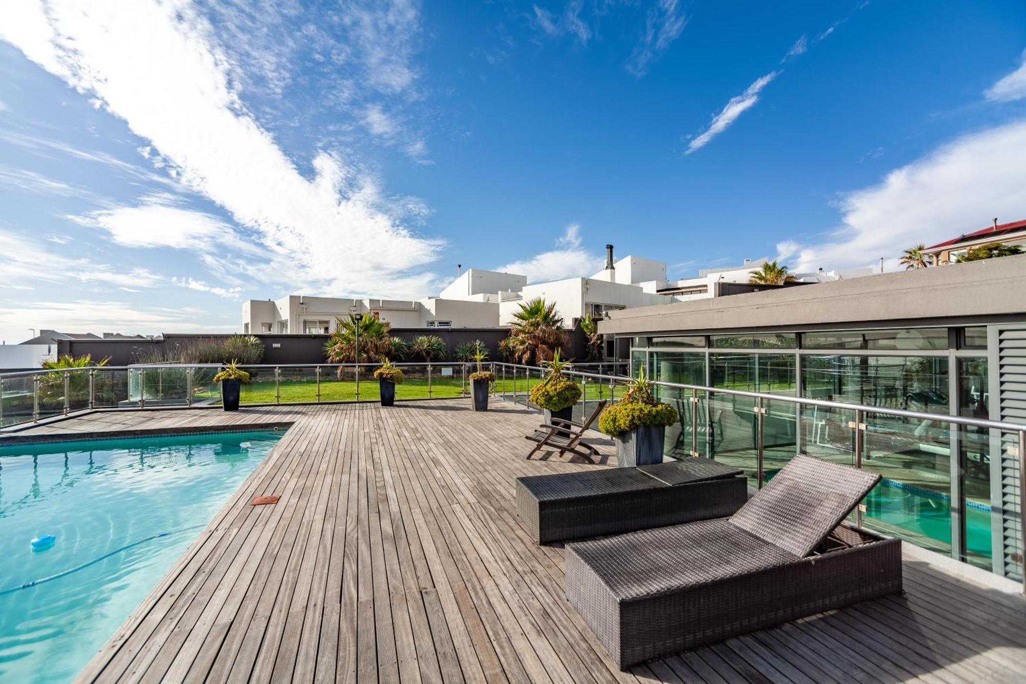 Modern Beachfront With Ocean Views - Infinity G9, Blouberg, Cape Town โบลแบร์กสตรานด์ ภายนอก รูปภาพ