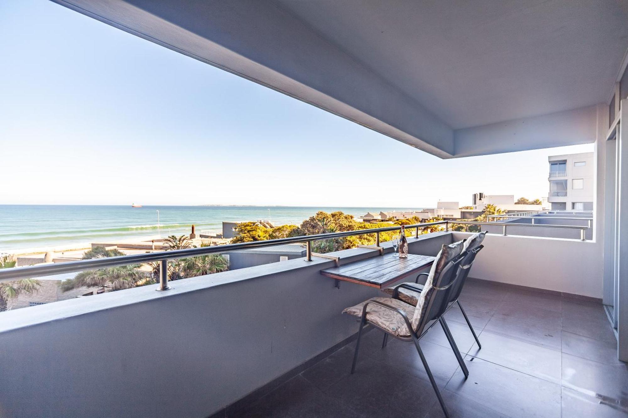 Modern Beachfront With Ocean Views - Infinity G9, Blouberg, Cape Town โบลแบร์กสตรานด์ ภายนอก รูปภาพ